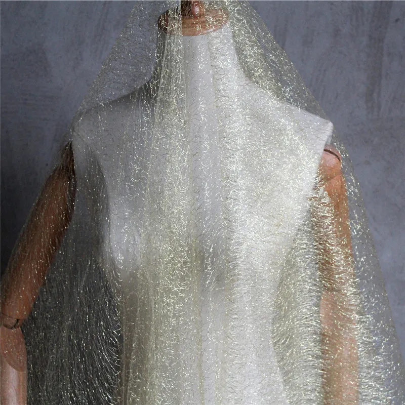 

Lace7 1Yard Fashion Irregular Hollow out Mesh Fabric Perspective Golden Gauze Wedding Dress Veil Lace Fabric The Curtain Cloth