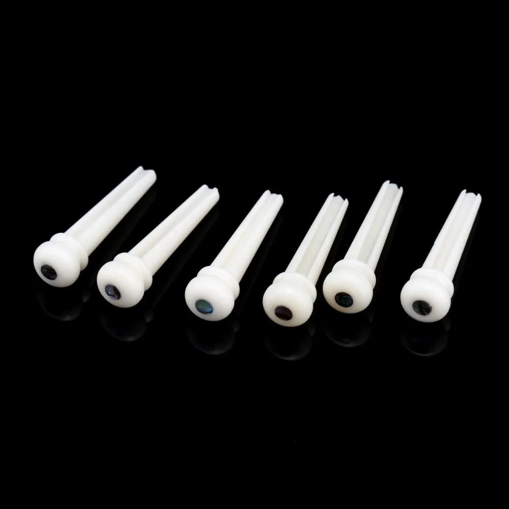 

Musiclily Slotted Bone Acoustic Guitar Bridge Pins, White with 3mm Green Pearl Shell Dot (6 Pieces)