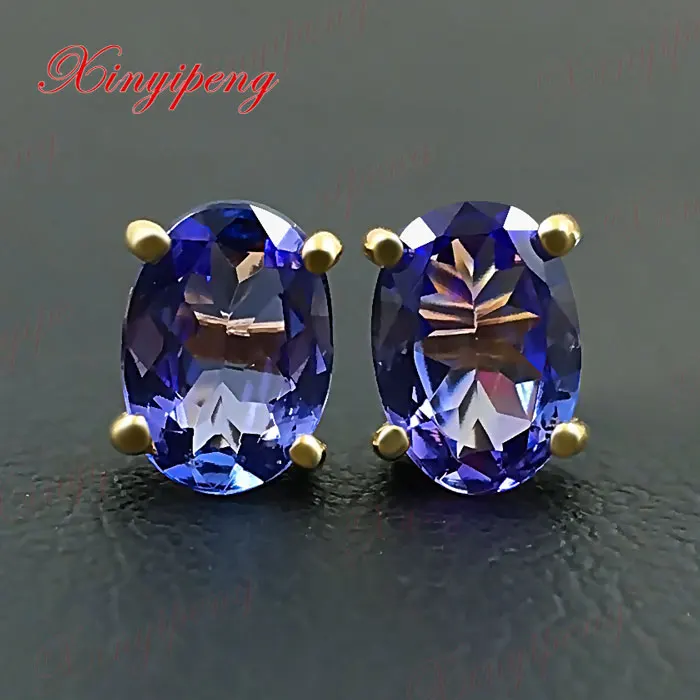 

18 k yellow gold with natural Tanzanite earrings Blue, and purple, of fire Fine jewelry contracted