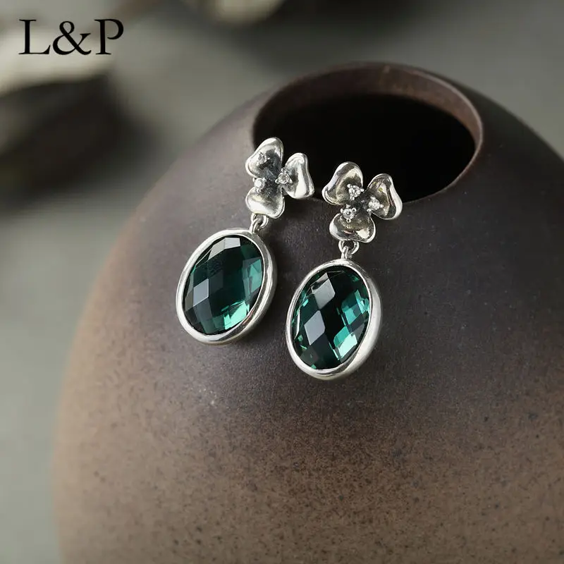 

Женские серьги из серебра 925 пробы, с зелеными кристаллами