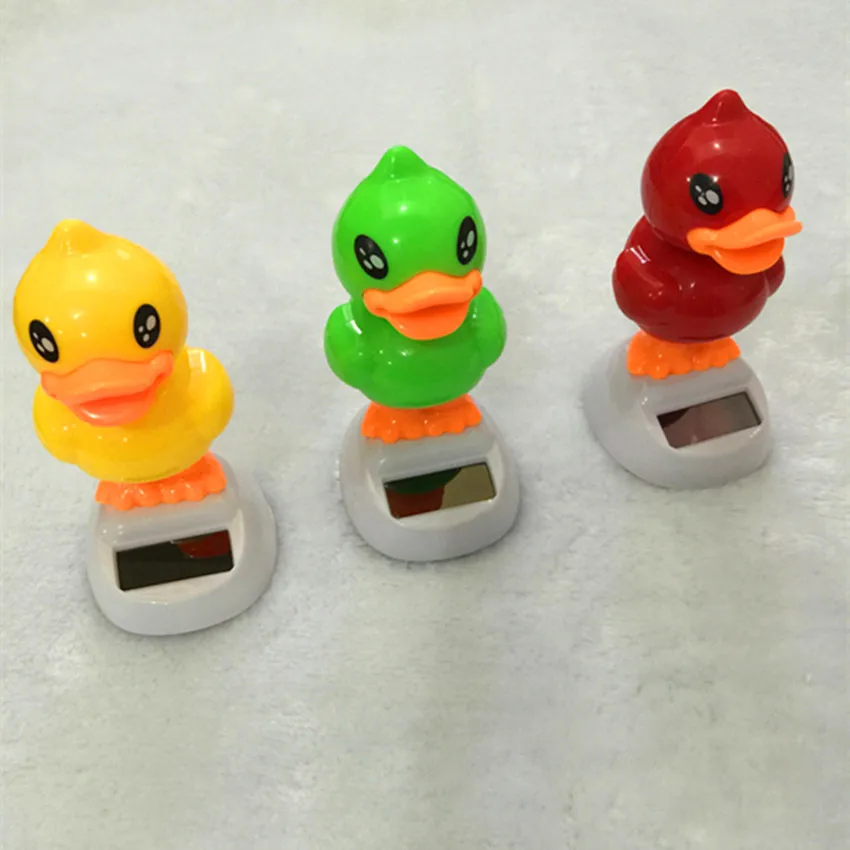 Вибрирующая голова ревеня утка украшение интерьера автомобиля на солнечной