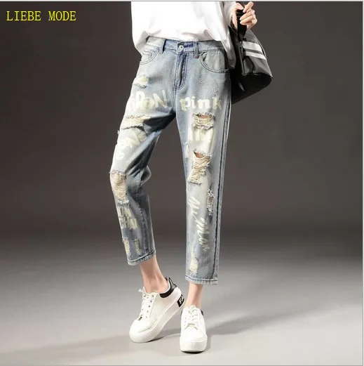 Джинсы женские рваные в потертом стиле модные штаны-султанки из денима до