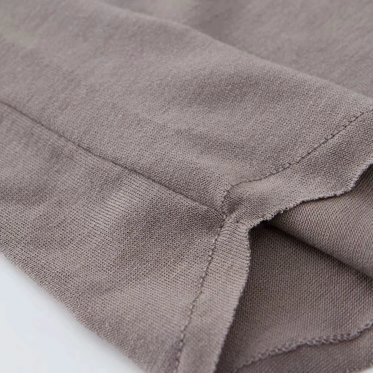 

Women Asymmetrical Neck T-shirt with Buttons Detail