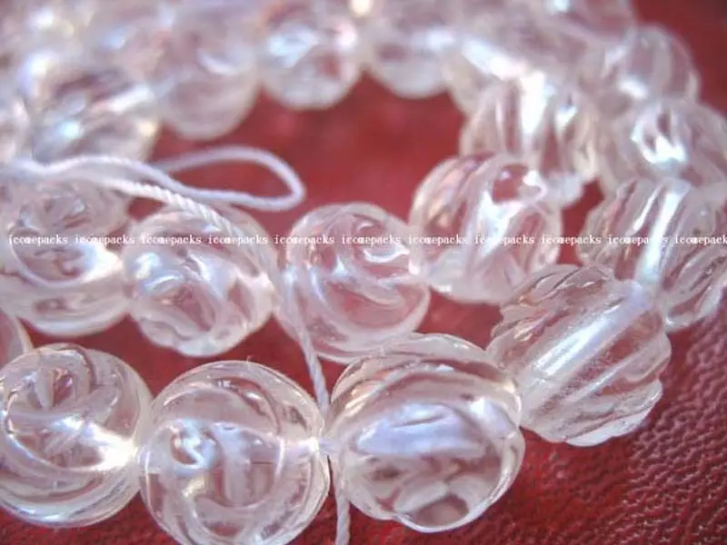 

wholesale quartz white carved flower 10mm nature AA grade 38 beads