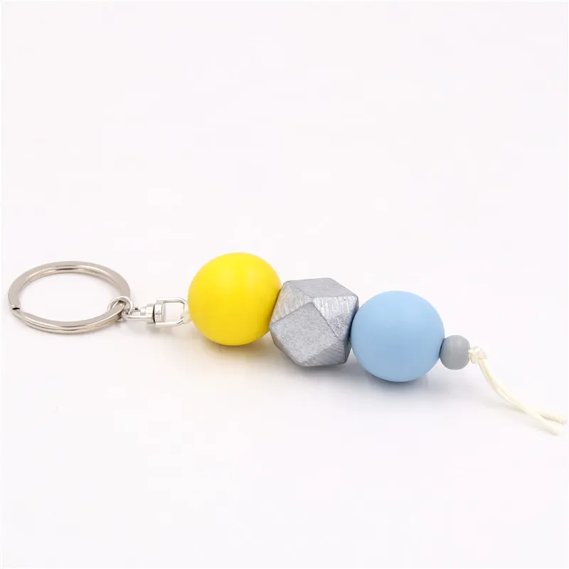 

1pc 2019 New Multicolor Geometric Wood Beads Keychain For Bag Round Wooden Beads Keyrings Gifts
