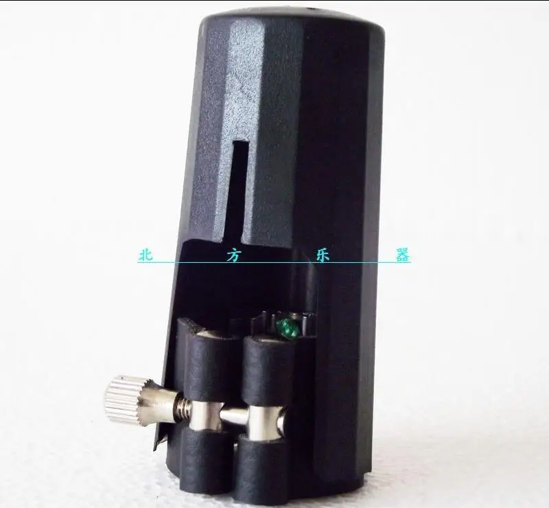 

Ligature and cap for clarinet and Alto Sax parts