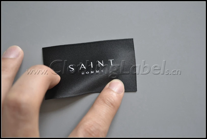 

Custom selvage satin woven labels for clothing, cut in piece