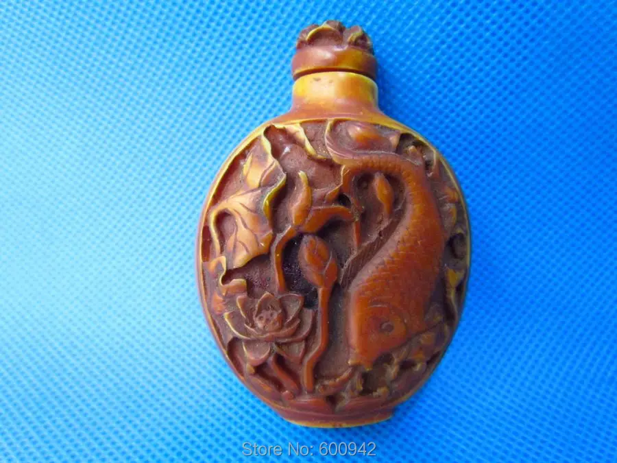 

Antique snuff box Snuff bottle Carven cyprinoid lotus flower on body Ornaments