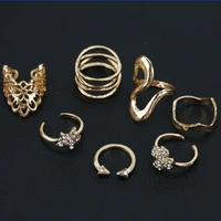 7 pcs different patterns golden rings per set hollow flower crystal cross stars punk style ring for women