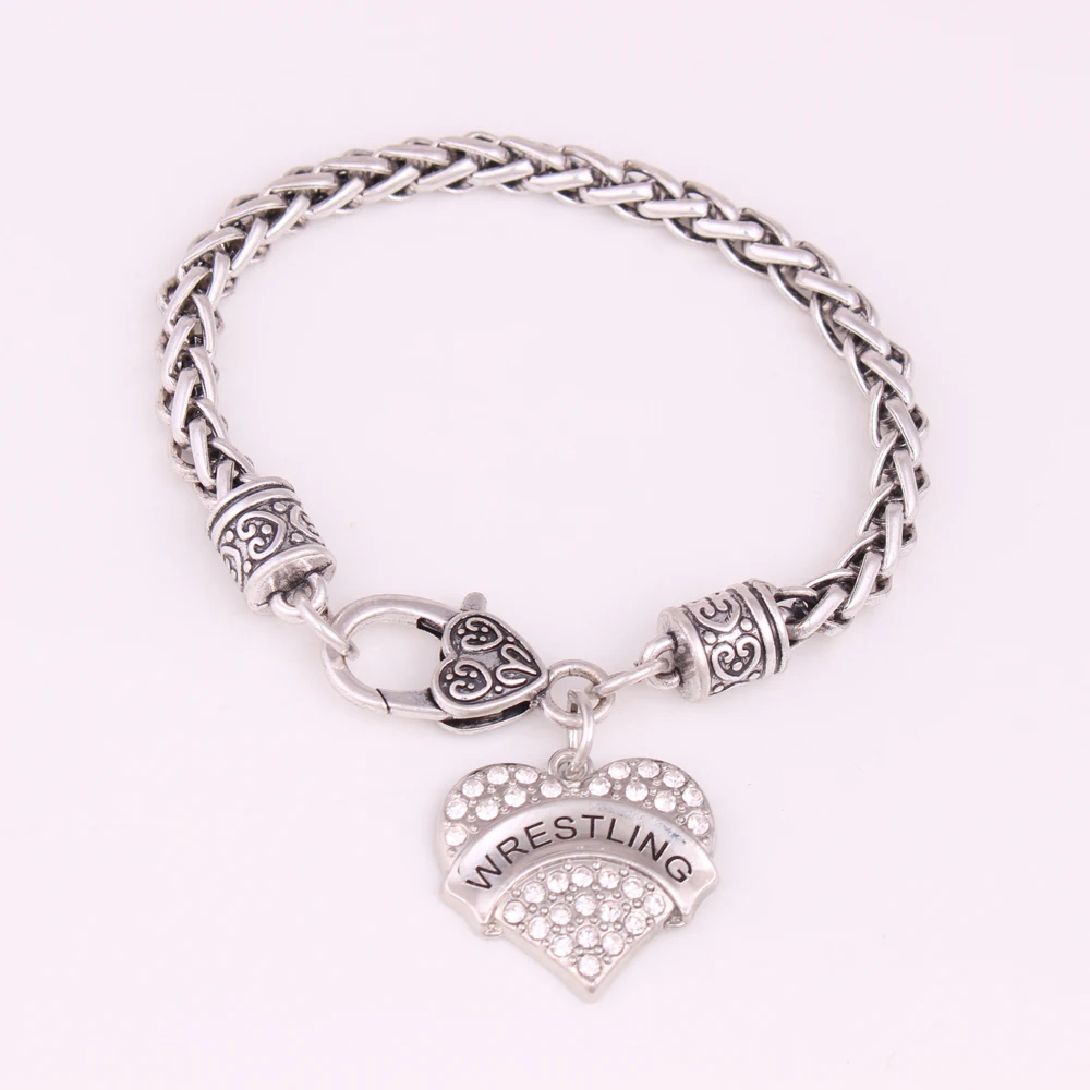 Браслет с подвеской "БОРЬБА" в виде сердца с блестящими кристаллами на цепочке пшеничного звена из цинкового сплава. Предоставляем услуги дропшиппинга.