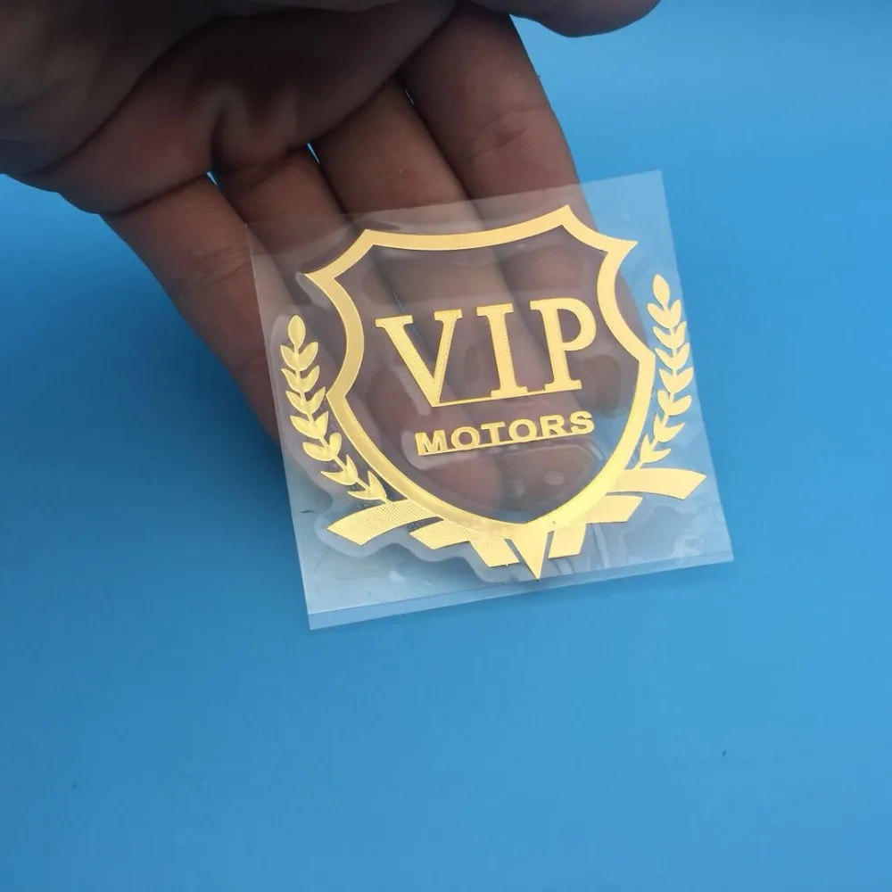 Логотип VIP MOTORS золотистого/серебристого цвета металлическая никелевая