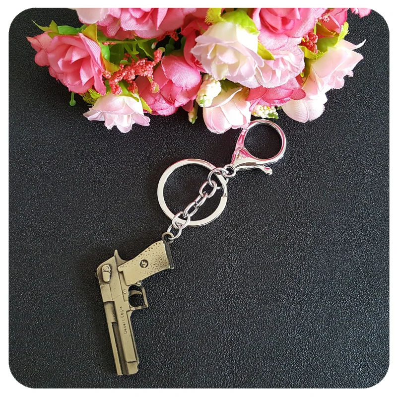 Муса Горячие Книги об оружии тема брелок для ключей бронза Цвет пистолет Брелоки
