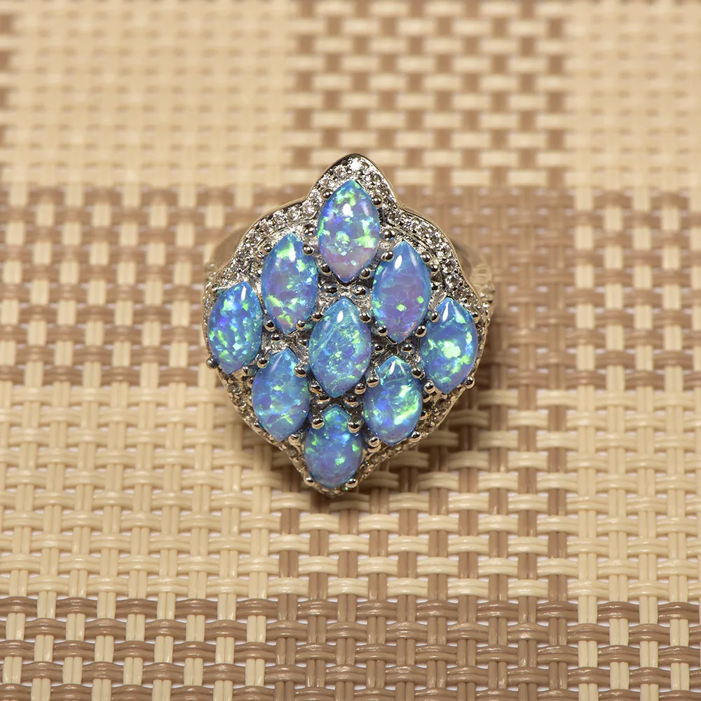 Кольцо Weinuo синее огненное Опаловое с белым кристаллом из серебра 925 пробы высокое