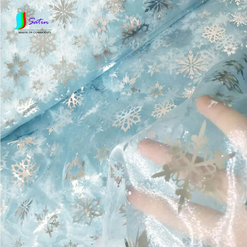 Рождественская трикотажная бронзовая ткань Снежный принт мультфильма Холодное