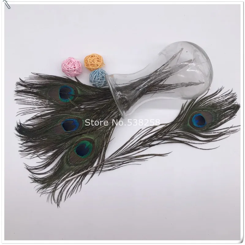 

100pcs/lot 25-35cm peacock feather for party performance wedding headwer HatHair accessories