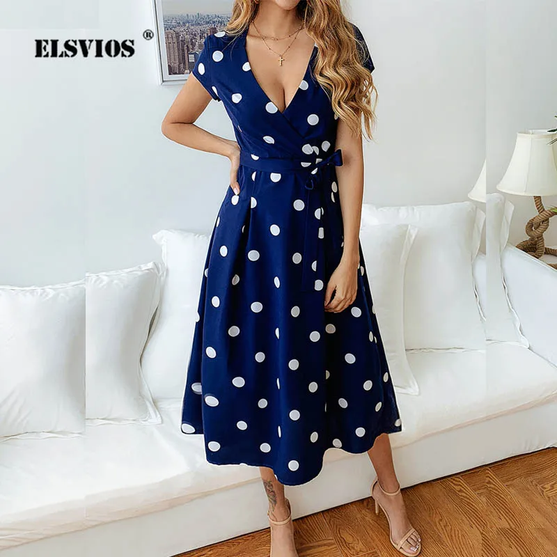 

Женское летнее платье в горошек с глубоким V-образным вырезом