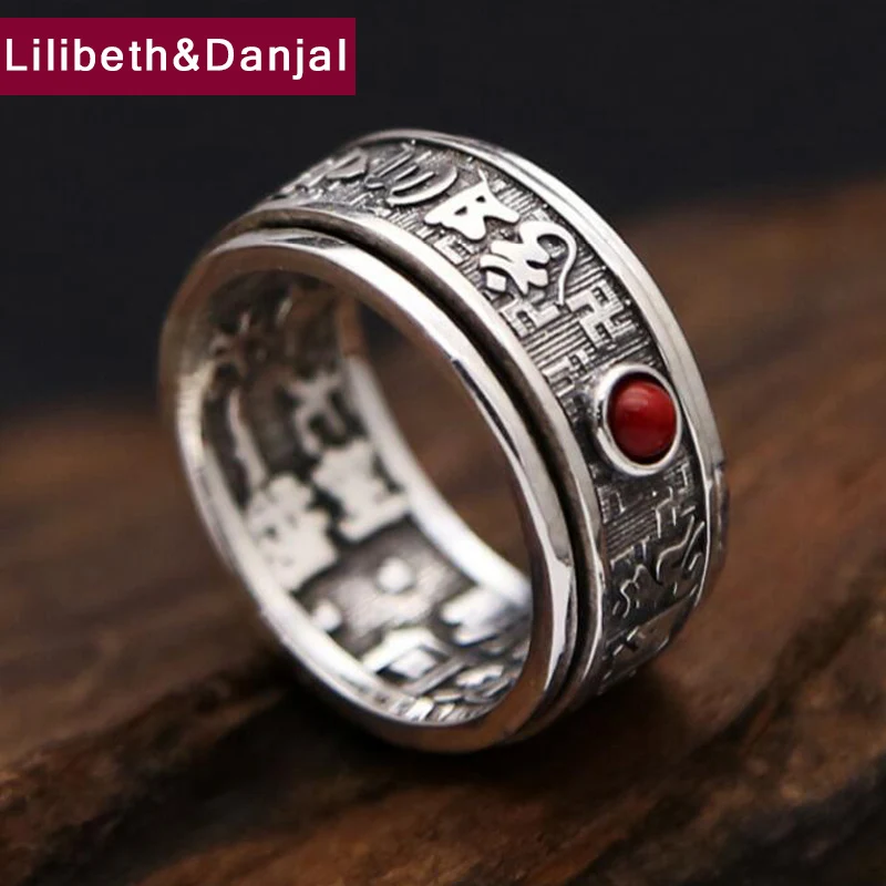 Свадебное кольцо с красным драгоценным камнем вращающееся на 100% градусов в форме