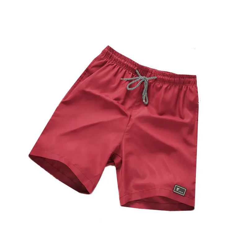 XT1586 2018 new summer fashion loose beach vacation speed dry men's shorts cheap wholesale | Мужская одежда