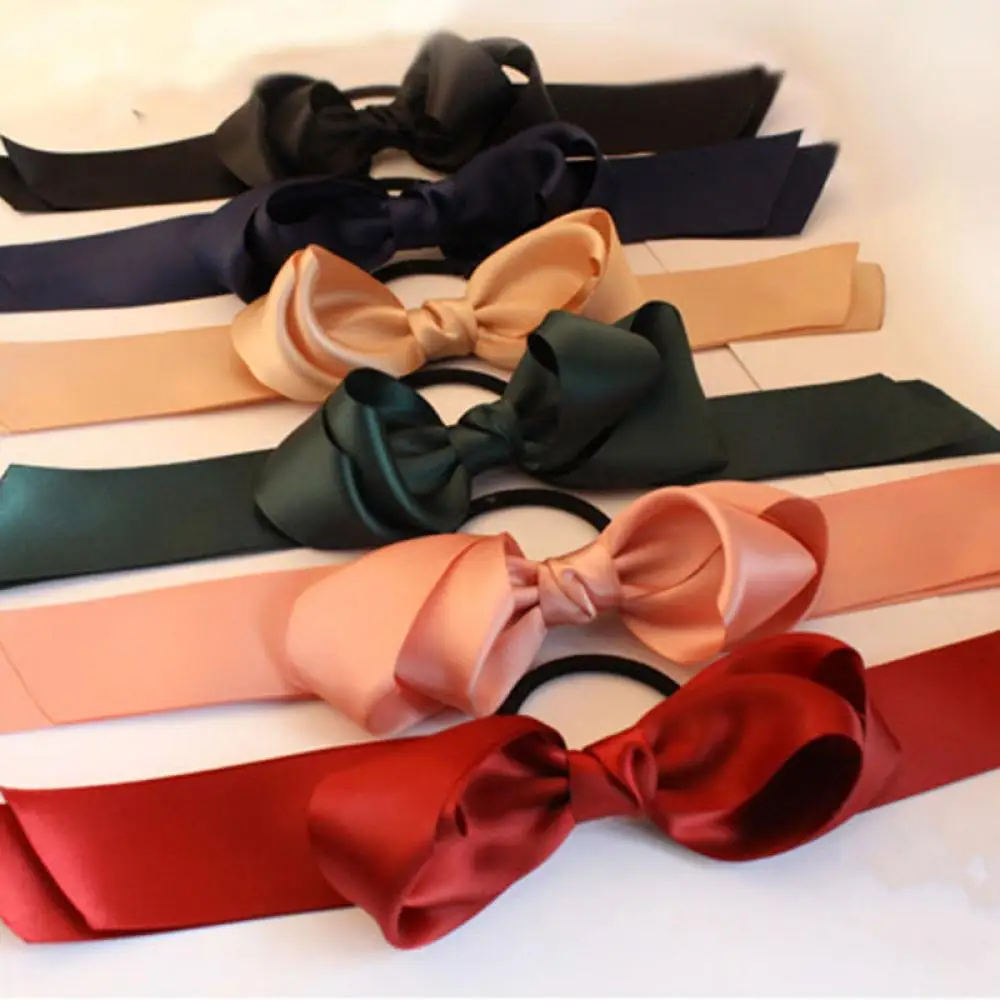 Резинка для волос с бантом |