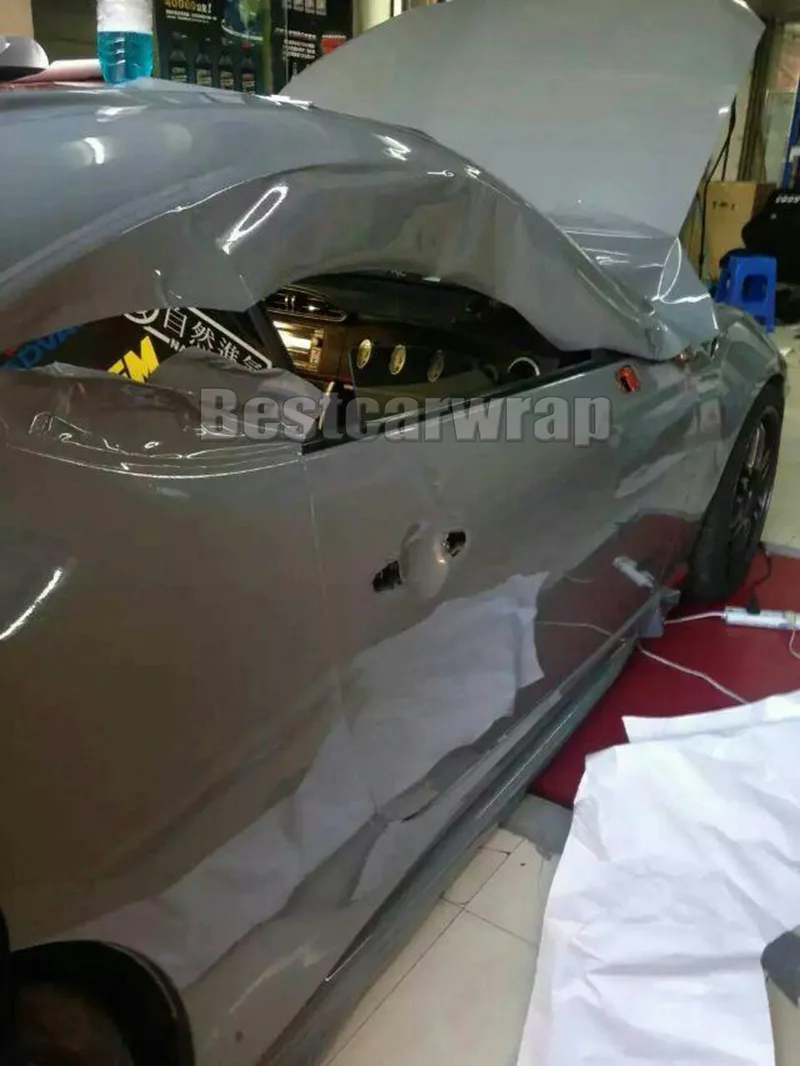 Цементная сверхглянцевая виниловая пленка Nardo серого цвета блестящая