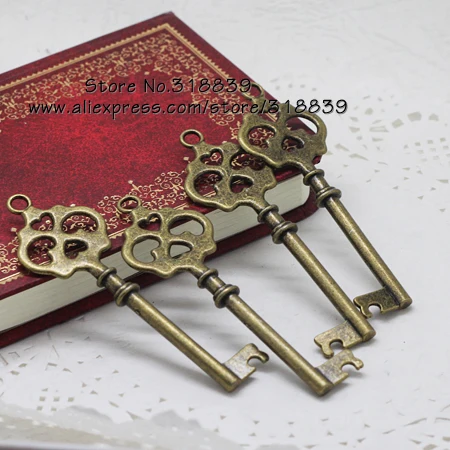 Античный металлический сплав цинка большие брелки в форме ключа Grimace Diy ювелирные