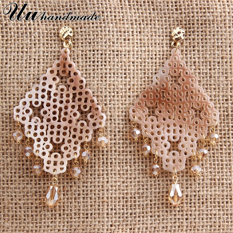 Новые богемные дизайн Обувь со сквозными отверстиями с украшением в виде