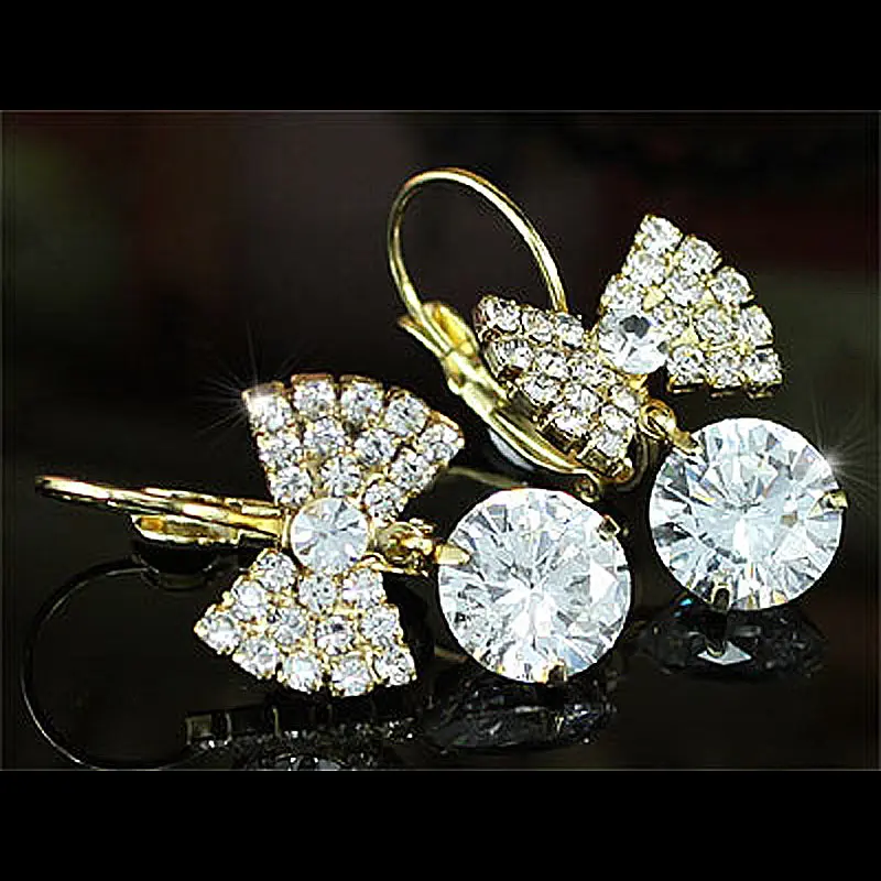 Белые серьги с павлиньими звездами луком и австрийским кристаллом CSE118|earrings austrian