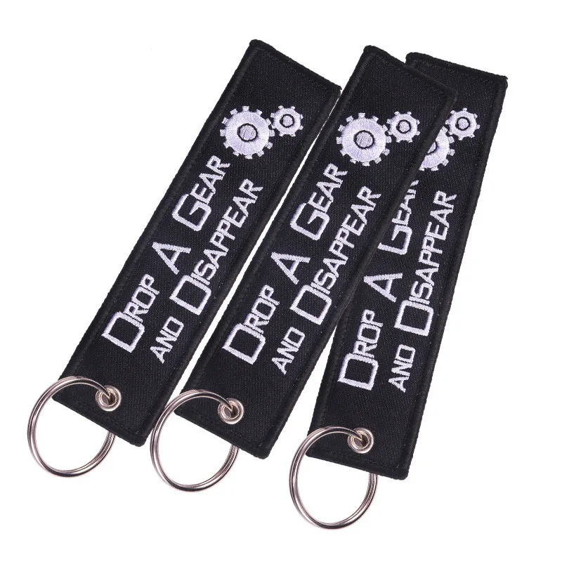 DoreenBeads модные бирки для связки ключей белые капли с рисунком шестеренки черный