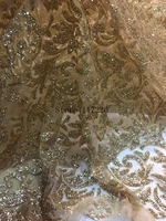 top selling french african glued glitter sequence lace fabric in gold color sequin lace fabric for party dress jrb 92552