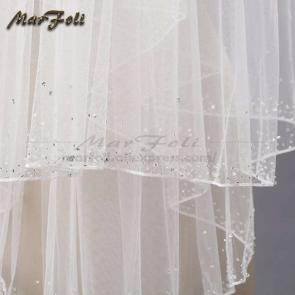 Свадебная фата белого цвета слоновой кости расшитая бисером с кристаллами
