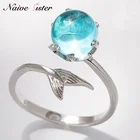 Кольцо женское, серебристого цвета, с синим драгоценным камнем