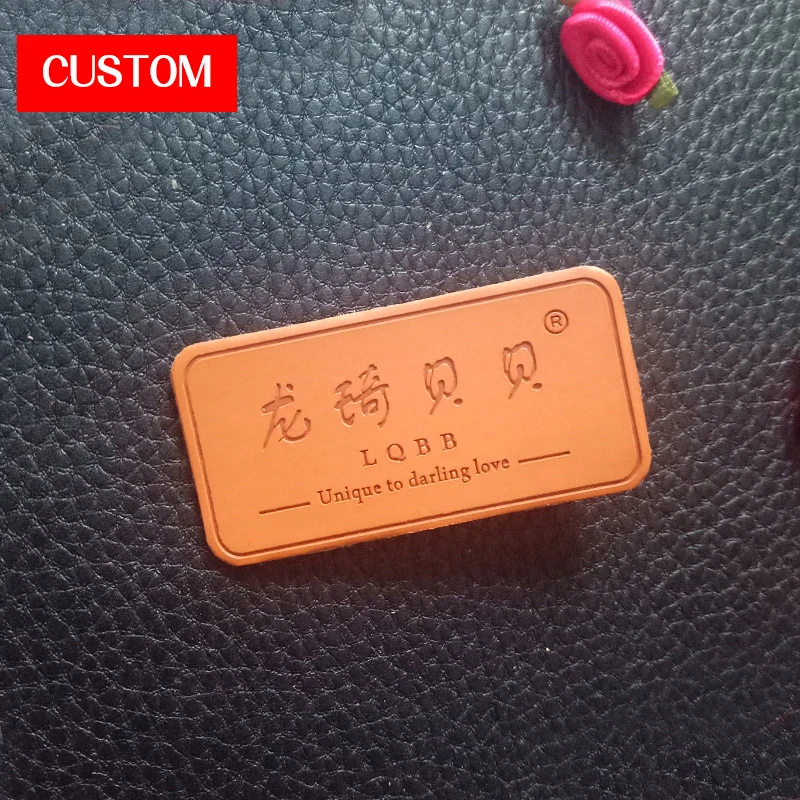 

factory private customzied metal PU leather embossed logo sewing on clothes private label branding main signs for clothing