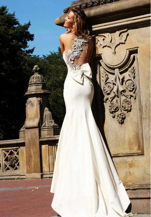 

Backless Mermaid wedding dresses 2016 sweetheart spaghetti straps beaded bow Robe de mariage Vestido De Noiva bridal gowns HS211