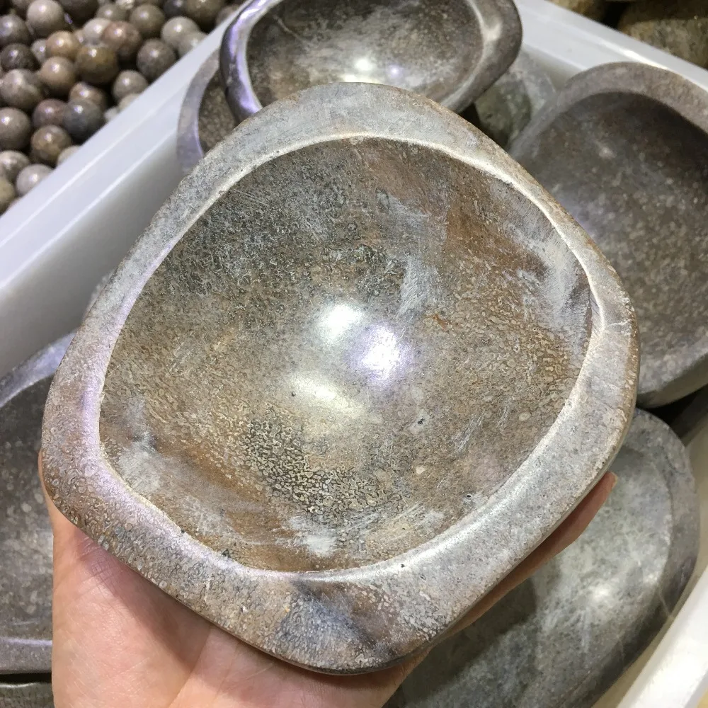 Натуральная пепельница из ископаемого камня в форме кости динозавра