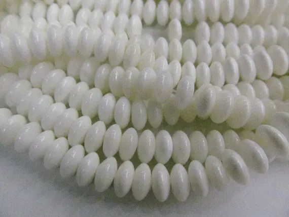 

natural white shell high quality 2strands 4-10mm wheel rondelle pinwheel loose bead