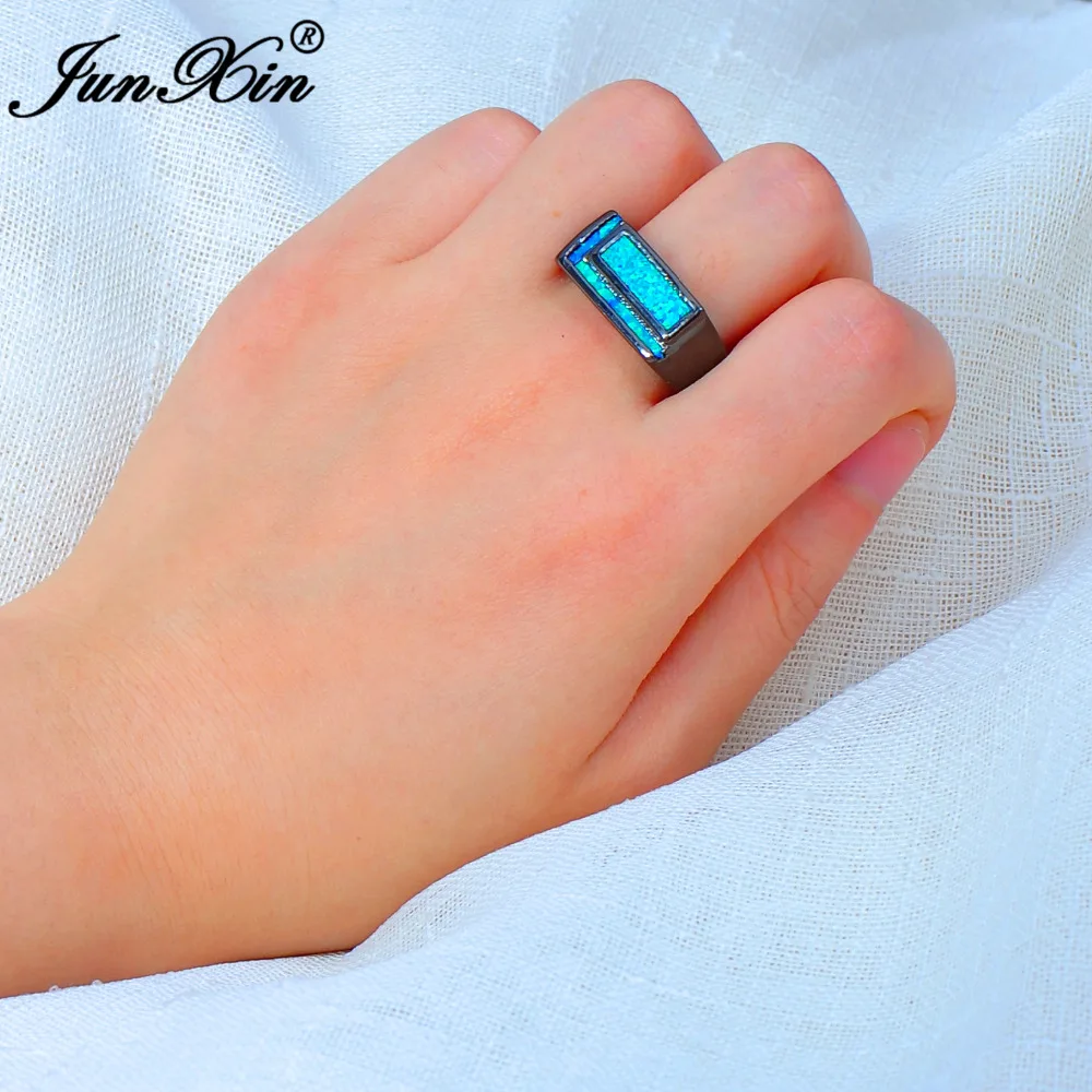 

JUNXIN New Geometric Design Men Women Blue Fire Opal Ring Vintage Black Gold Wedding Rings Classical Jewelry Gifts