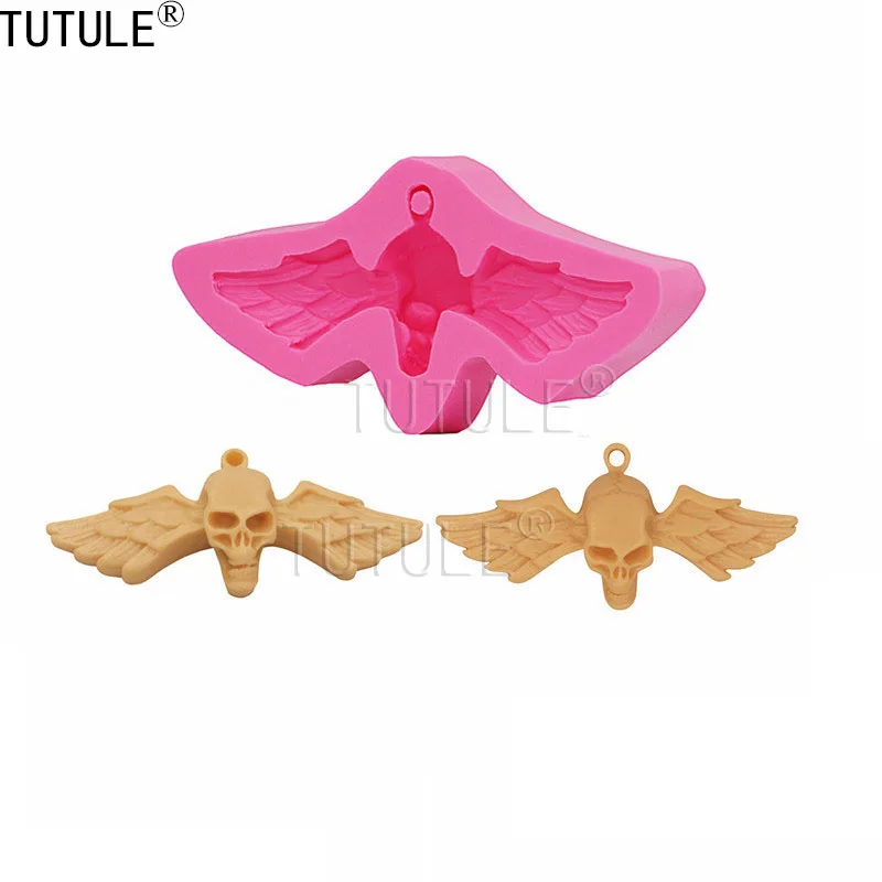 Силиконовая форма с ангельскими крыльями и черепами изготовленная из