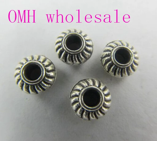

OMH wholesale 50g 165pcs 6.5x3.5 mm Jewelry accessories Zinc alloy UFO Stripes space beads for bracelet PJ154
