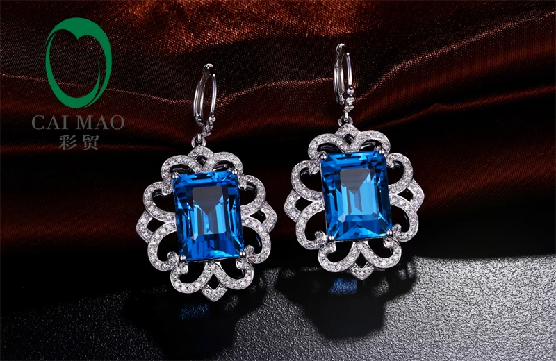 Женские серьги из белого золота 10 х13 мм с изумрудом | Украшения и аксессуары