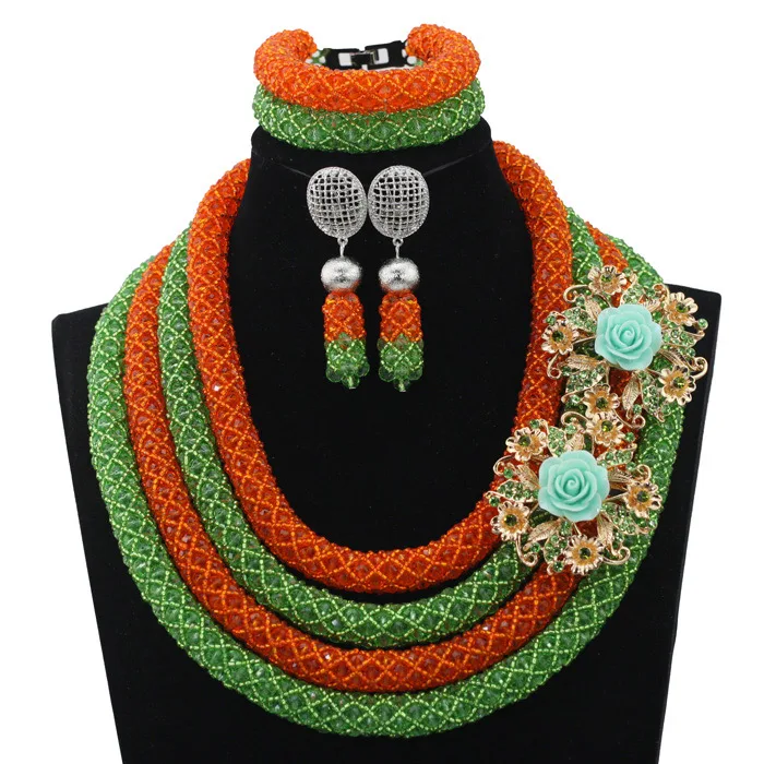 Фантастический свадебный костюм в нигерийском стиле зеленого цвета