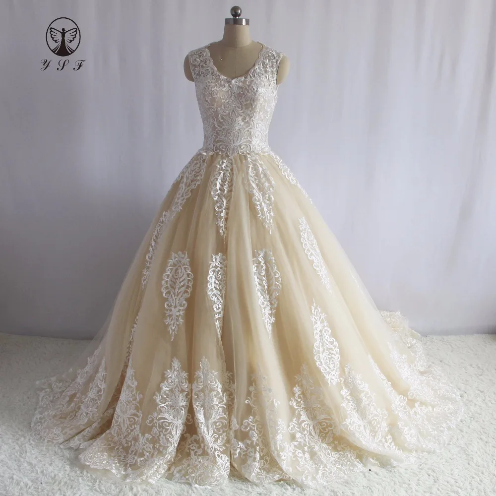 

Элегантное платье цвета шампанского Vestidos De Novias с v-образным вырезом и аппликацией, кружевное свадебное платье без рукавов трапециевидной фо...