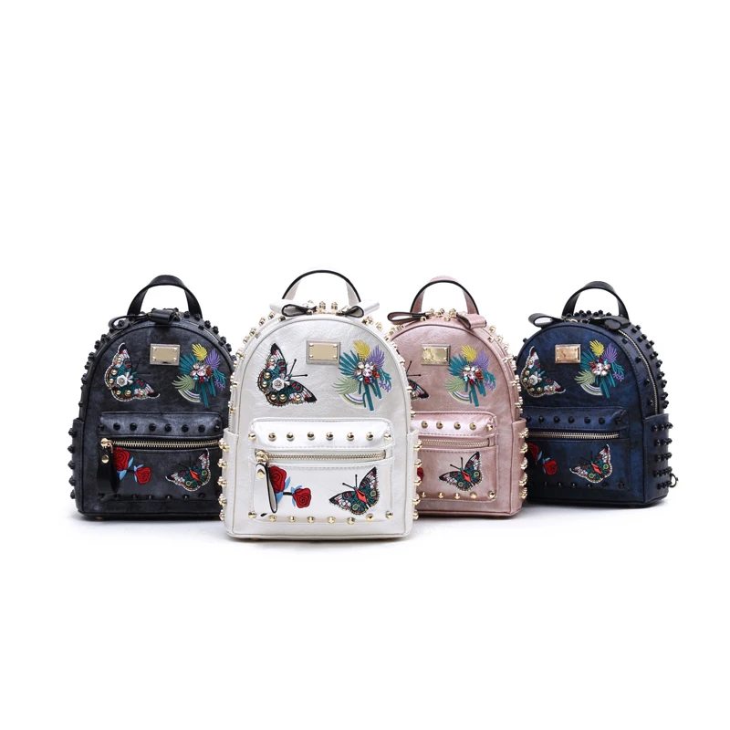 

2021 new butterfly yellow rivet shoulder bag butterfly flower embroidery backpack fashion leisure travel bag school bag Y350