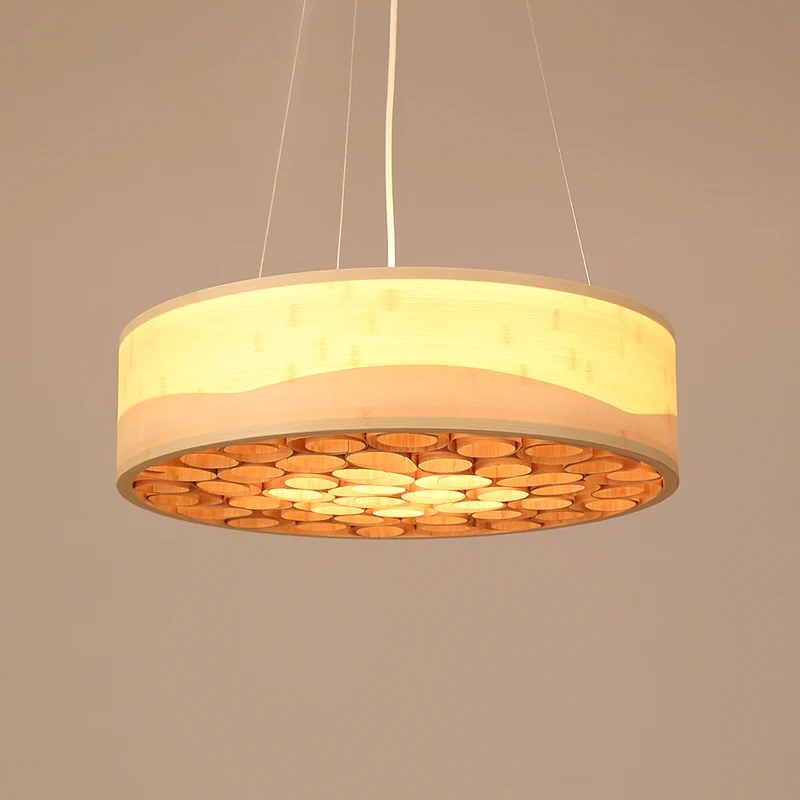 Современные круглые минималистичные подвесные светильники из бамбука.