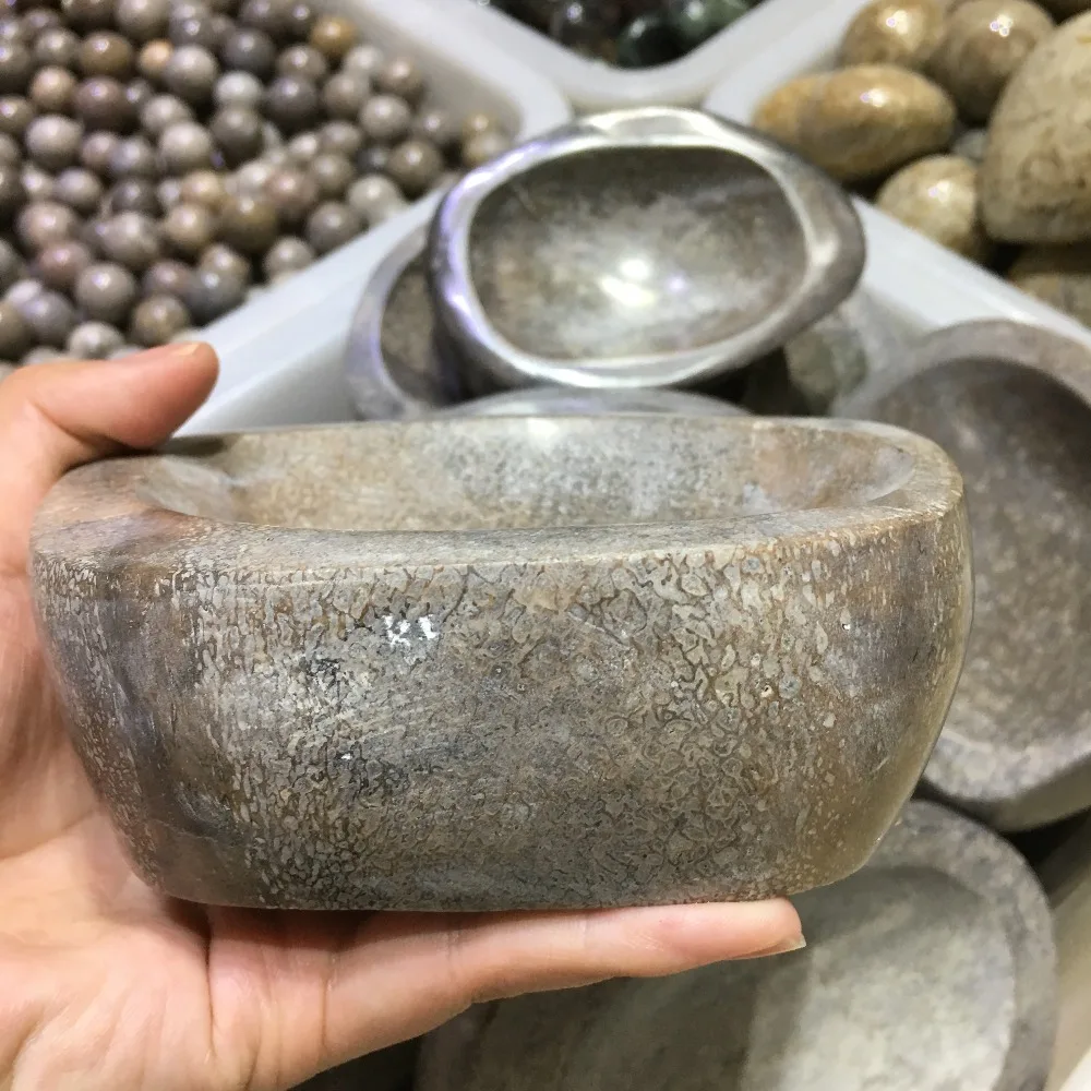 Натуральная пепельница из ископаемого камня в форме кости динозавра