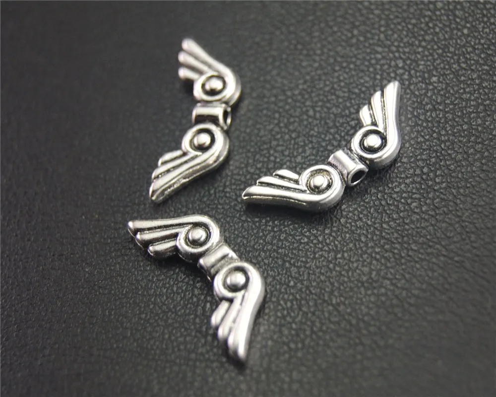 

30pcs Silver Color Wings Spacer Beads For Jewelry Making DIY Handmade Craft 7x20mm A1989