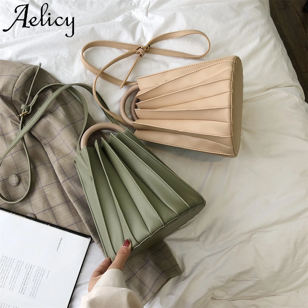 Женская сумка мессенджер Aelicy однотонная кожаная в ретро стиле с карманом для