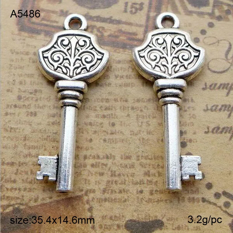 

25pcs Vintage Silver Zinc Alloy Retro Key Charms Pendant Charms 35.4x14.6mm