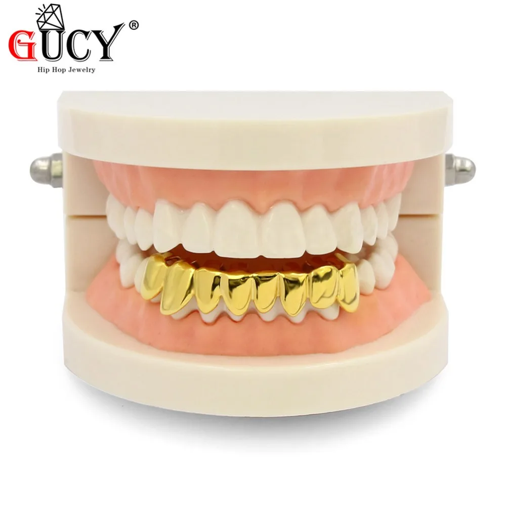 Gucy индивидуальный стиль хип хоп grillz Gold Цвет покрытием капельного Стиль зубы гриль в форме нижней части зуба грили подарок на Хэллоуин