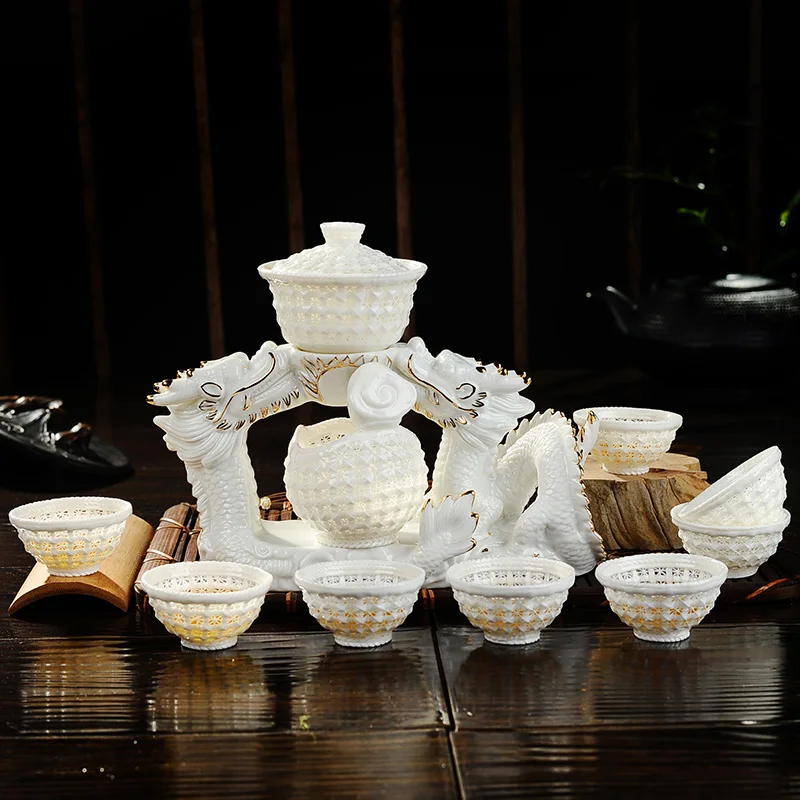 Pure hand woven exquisite tea set automatic crystal hollow ceramic bone China Kung Fu of high-end gift box | Обустройство дома
