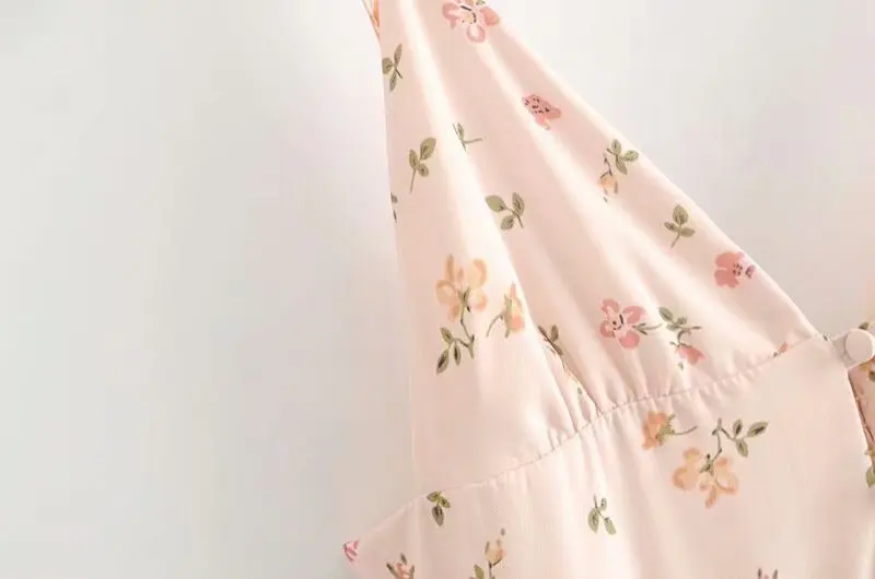 Женское платье с глубоким вырезом H. SA бежевое без рукавов цветочным принтом